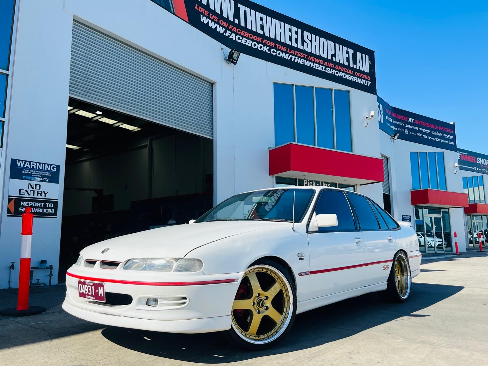 HOLDEN COMMODORE WITH SIMMONS WHEELS |  | HOLDEN