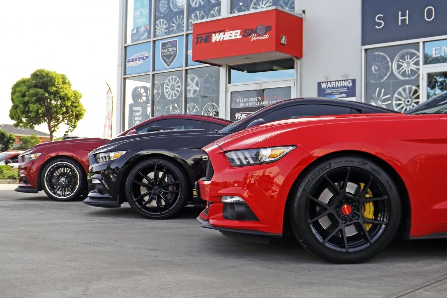 FORD MUSTANGS AT THE WHEEL SHOP |  | FORD